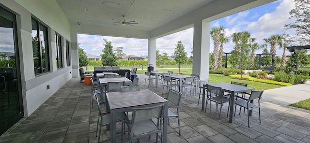 view of patio / terrace featuring an outdoor living space and ceiling fan