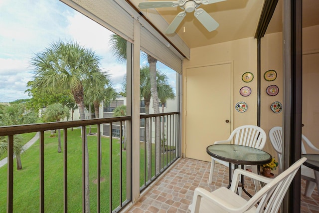 balcony featuring ceiling fan