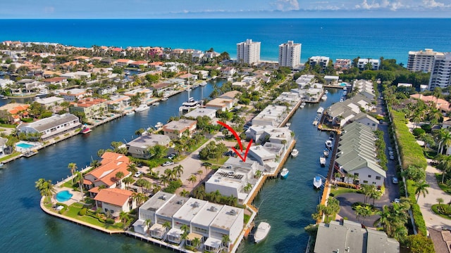 birds eye view of property featuring a water view