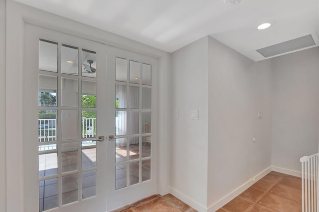 doorway to outside featuring french doors