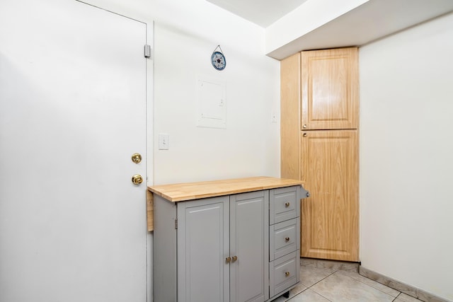 interior space with light tile patterned floors