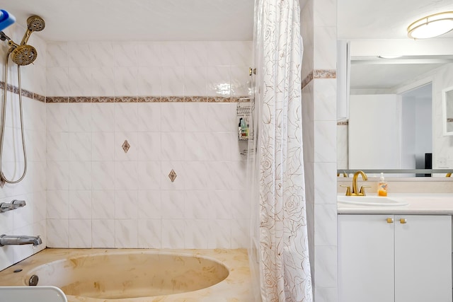 bathroom with shower / tub combo and vanity