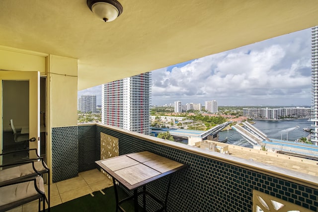 balcony featuring a water view