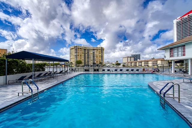 view of swimming pool featuring a patio