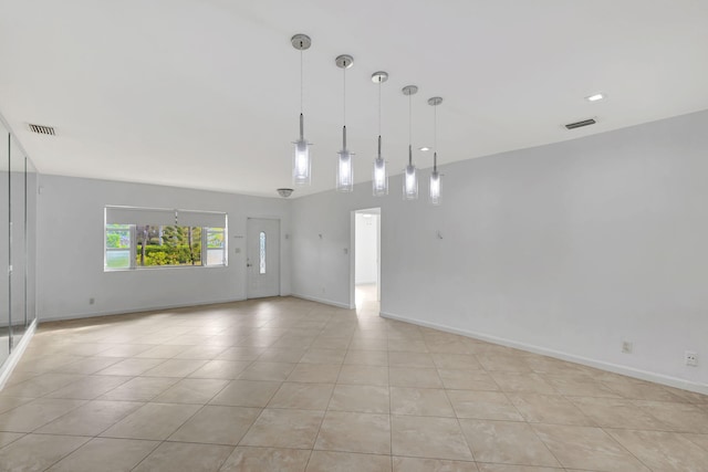 spare room with light tile patterned floors