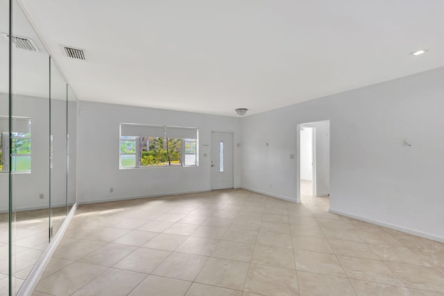 view of tiled spare room