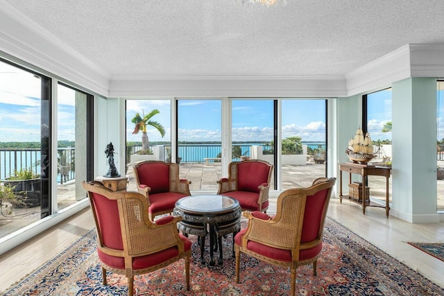 sunroom with a water view