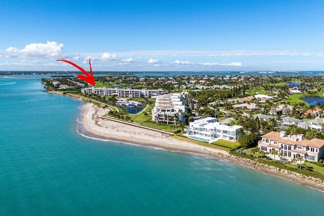 aerial view with a beach view and a water view