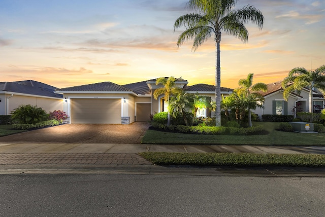 view of front of property with a garage