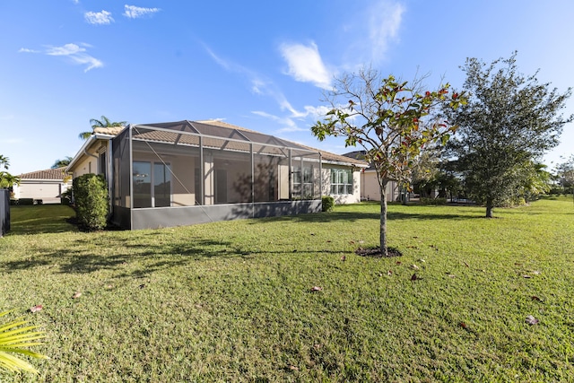 view of yard featuring glass enclosure