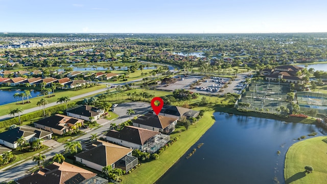 bird's eye view with a water view