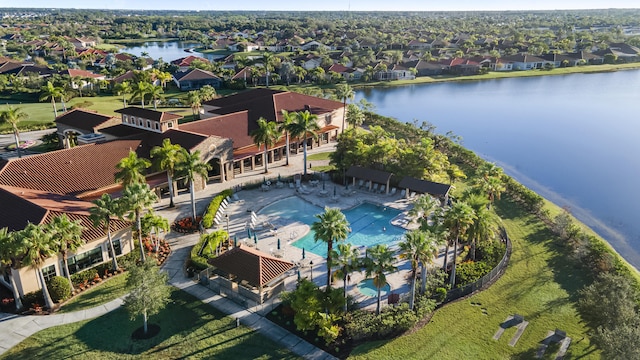 bird's eye view with a water view