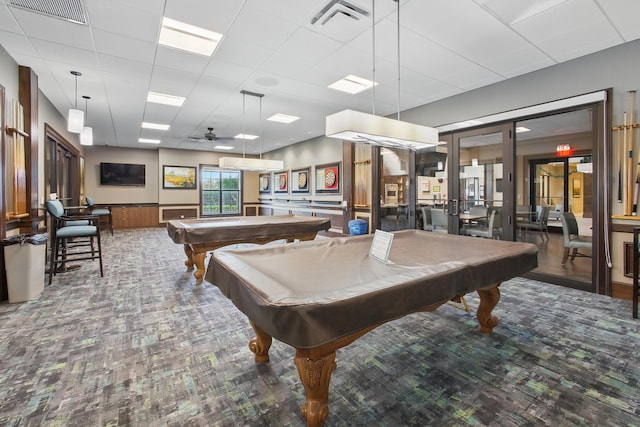 playroom featuring a drop ceiling, pool table, and french doors