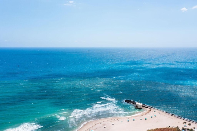 property view of water featuring a beach view