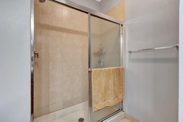 bathroom with an enclosed shower