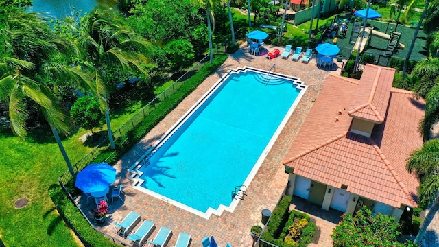 view of swimming pool featuring a patio