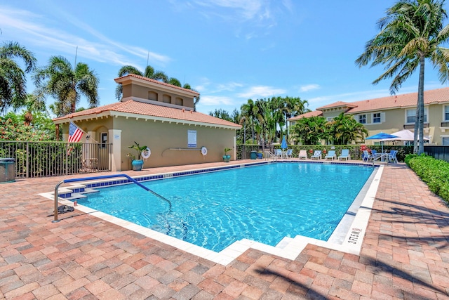 view of swimming pool featuring a patio