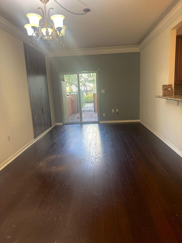 entryway featuring crown molding and dark wood-type flooring