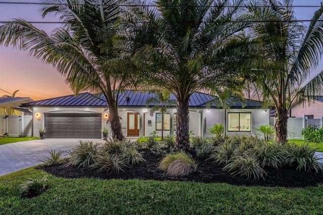 view of front of home with a garage