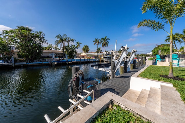 dock area with a water view