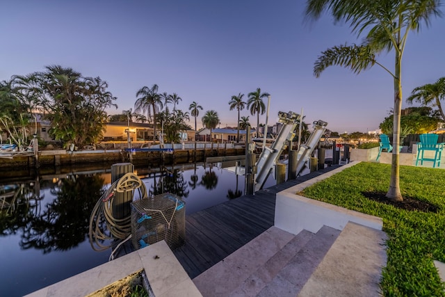 dock area with a water view