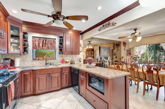 kitchen featuring kitchen peninsula, light stone counters, ornamental molding, and black appliances