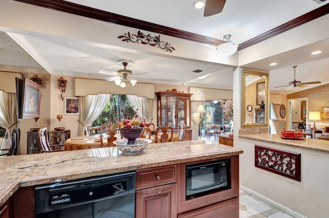 kitchen with light stone countertops, crown molding, and black appliances