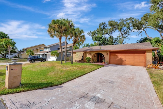 ranch-style house with a front lawn and a garage