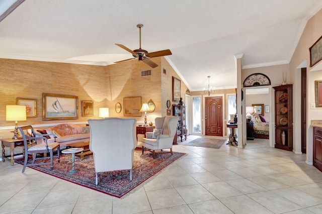 tiled living room featuring crown molding, high vaulted ceiling, and ceiling fan with notable chandelier