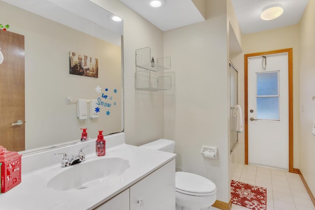 full bathroom featuring tile patterned floors, vanity, bath / shower combo with glass door, and toilet