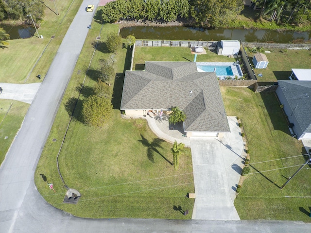 bird's eye view with a water view