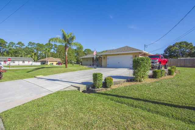 ranch-style house with a front lawn and a garage