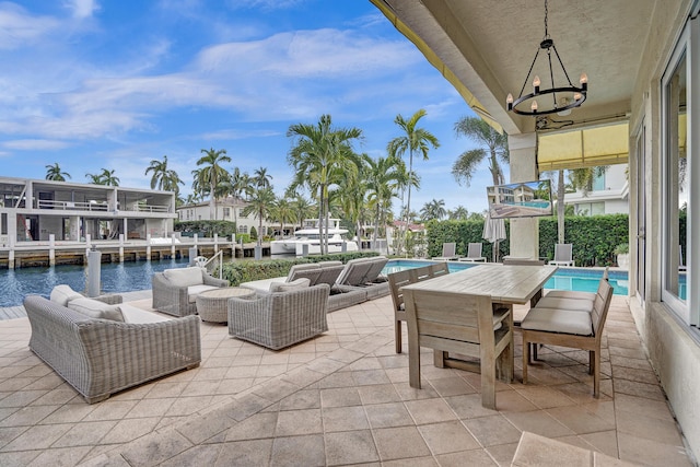 view of patio featuring a water view and an outdoor hangout area