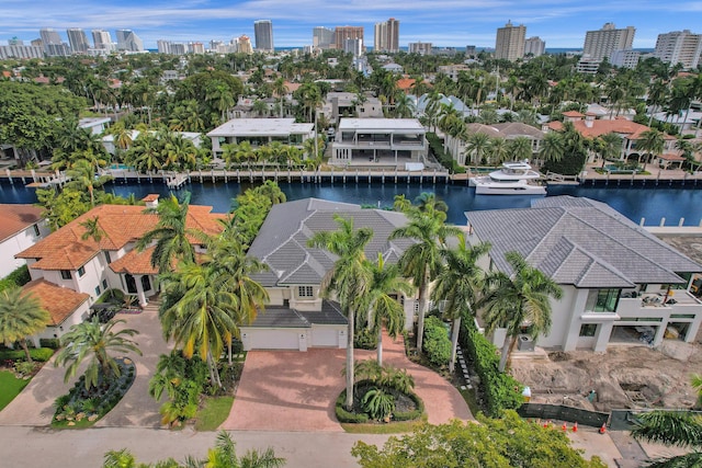 birds eye view of property featuring a water view