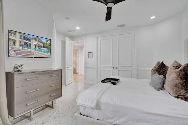 bedroom featuring a closet and ceiling fan