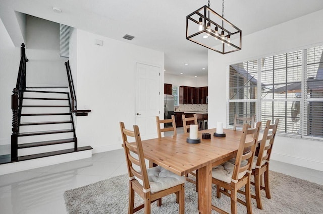 dining room featuring an inviting chandelier