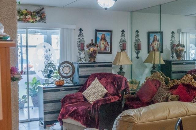 sitting room with light tile patterned flooring