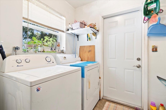 washroom with washer and dryer