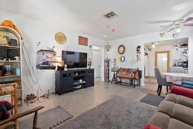 living room with ceiling fan