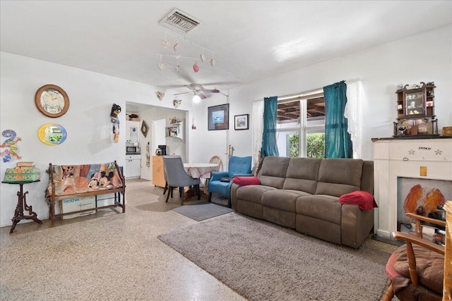 living room with ceiling fan