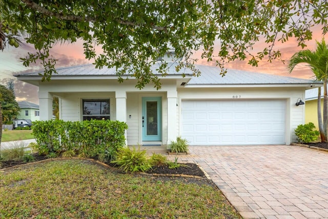 ranch-style home with a garage