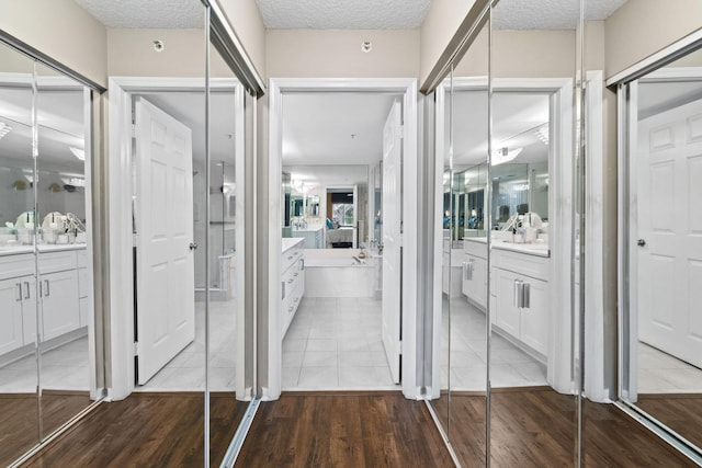 corridor featuring hardwood / wood-style floors