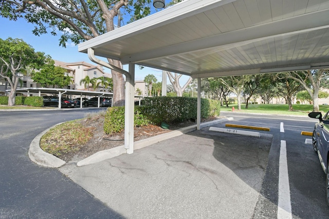 view of parking with a carport