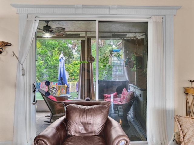 interior space featuring ceiling fan