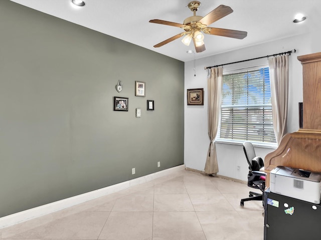 tiled office space with ceiling fan