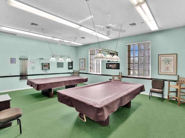 rec room with carpet, a textured ceiling, and billiards