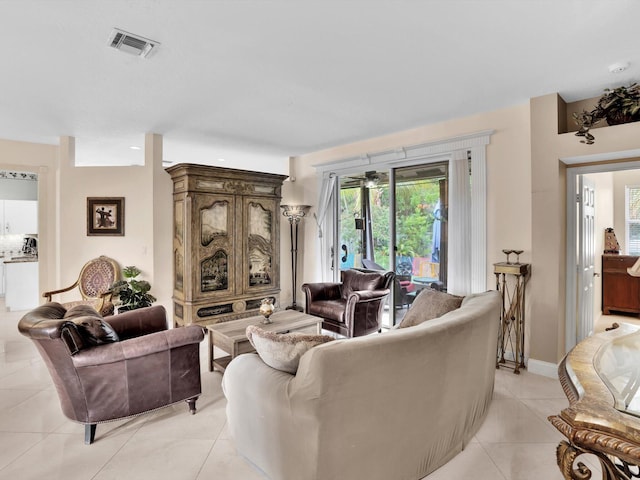 living room with light tile patterned floors