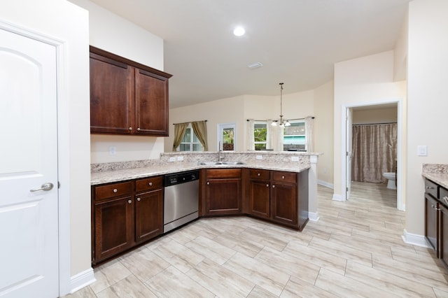 kitchen with kitchen peninsula, light stone counters, an inviting chandelier, dishwasher, and hanging light fixtures