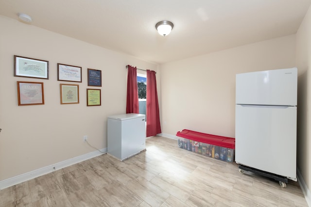 washroom featuring light hardwood / wood-style floors