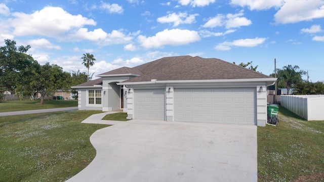 ranch-style house with a front yard and a garage